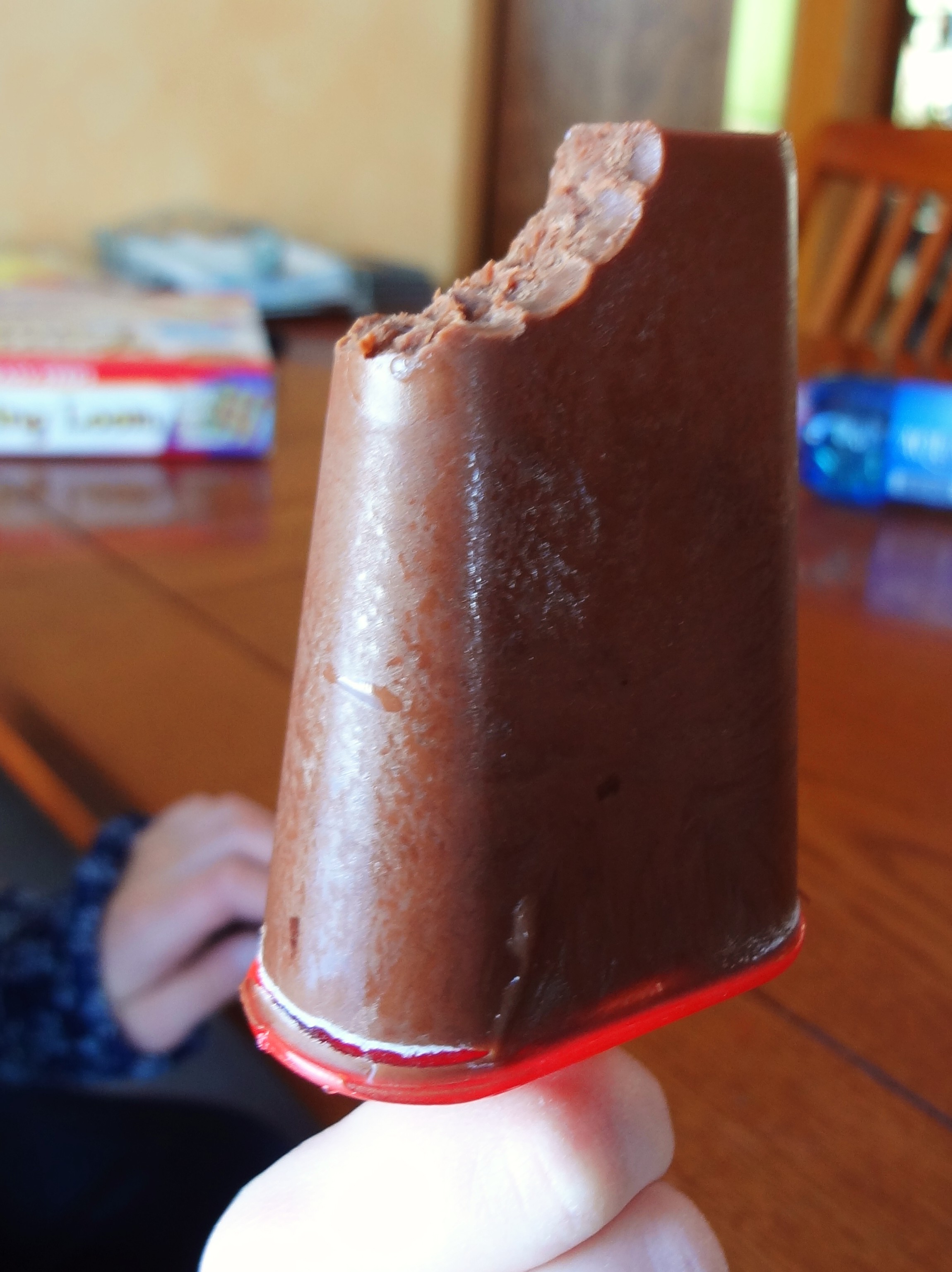 Craving a chocolatey frozen treat? Make these dairy free, soy free, and peanut free Dark Chocolate Popsicles (aka Fudgesicles) for a cool treat that's healthier than store-bought - @TheFitCookie #dairyfree #grainfree #glutenfree #popsicles
